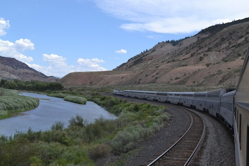 The August Millennial Train cars hug the Colorado River behind Amtrak's California Zephyr. Photo by Malcolm Kenton.